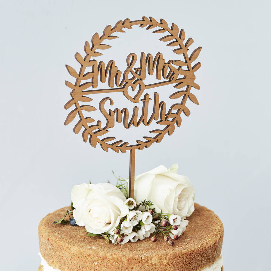 personalised laurel wooden  wedding  cake  topper  by sophia 