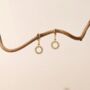 Solstace | Delicate Huggie Hoop Sun Charm Earrings, thumbnail 1 of 4