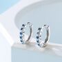Sapphire Blue Cz Bezel Huggie Hoop In Sterling Silver, thumbnail 1 of 12