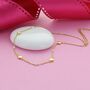 Tiny White Enamel Clover Necklace, thumbnail 1 of 2