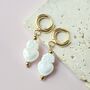 White Ceramic Sacred Heart Charm Huggie Earrings, thumbnail 1 of 4