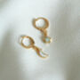 Opal Star And Moon Celestial Gold Huggie Hoop Earrings, thumbnail 1 of 2