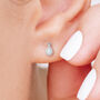 Mini Sterling Silver Teardrop White Opal Stud Earrings, thumbnail 2 of 11