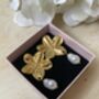 Gold Flower Pearl Drop Earrings, thumbnail 1 of 6