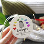 Baby First Christmas Rainbow Penguin Decoration, thumbnail 5 of 9