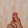 Sterling Silver Tiny Four Point Star Huggie Hoop Earrings, thumbnail 4 of 11