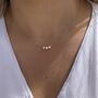 Tiny Gold Star Necklace, thumbnail 1 of 11