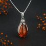 Personalised Sterling Silver Baltic Amber Penguin Necklace, thumbnail 1 of 8