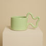 Green Handmade Ceramic Mug With Wiggle Handle, thumbnail 1 of 6