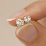 Sterling Silver Love Knot Micro Stud Earrings, thumbnail 1 of 6