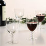 Four Luxury Beaded Stem Wine Glasses, thumbnail 1 of 9