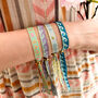 Set Of Four Festival Ribbon Bracelets, Waves/Words, thumbnail 2 of 5