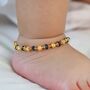 Gold And Black Beaded Baby Nazaria Bracelet/Anklet, thumbnail 1 of 2