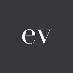Ev Home white logo on black background