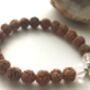 Rudraksha Silver Lotus Charm Yoga Bracelet, thumbnail 1 of 9