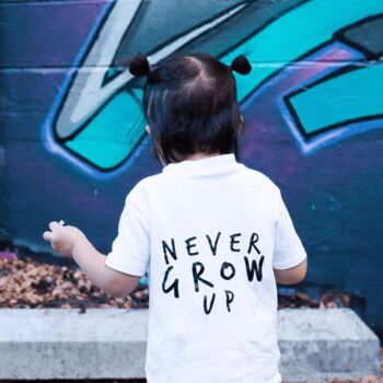 Never Grow Up Unisex Baby And Kids Short Sleeve T Shirt, 5 of 12