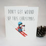 Don't Get Wound Up Tin Toy Christmas Card, thumbnail 1 of 5