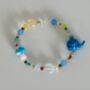 Multi Coloured Beaded Dolphin Bracelet, thumbnail 1 of 3