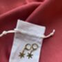 Gold Plated Snowflake Huggie Hoop Christmas Earrings, thumbnail 3 of 4