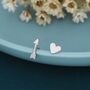 Mismatched Tiny Arrow And Heart Stud Earrings, thumbnail 1 of 9