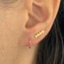 Tiny Gold Plated Arrow Stud Earrings, thumbnail 3 of 4