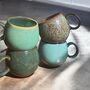 Set Of Four Reactive Glaze Mugs In Tones Of The Rainforest, thumbnail 4 of 11
