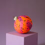 Neon Orange, Pink And Purple Painted Ceramic Bauble, thumbnail 2 of 5