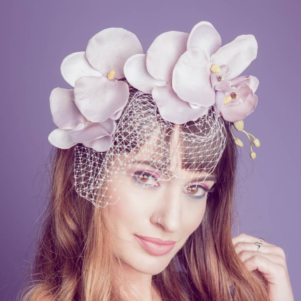 cascading orchid fascinator with veil by gg's pinup couture