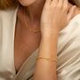 18ct Gold Eternity Twist Charm Collector Bracelet, thumbnail 1 of 5
