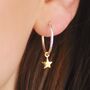Sterling Silver Hoop And Gold Star Earrings, thumbnail 1 of 6