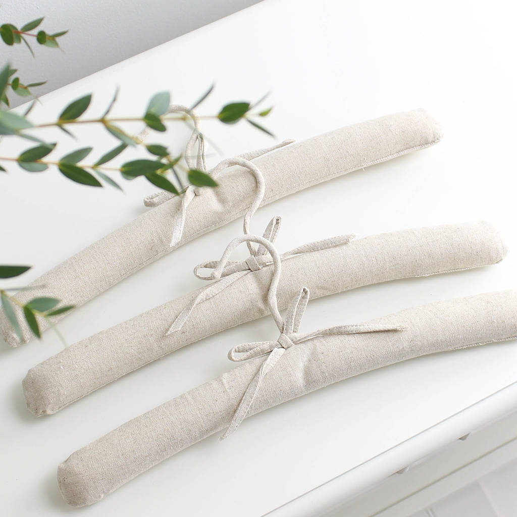 three natural linen padded hangers by marquis & dawe