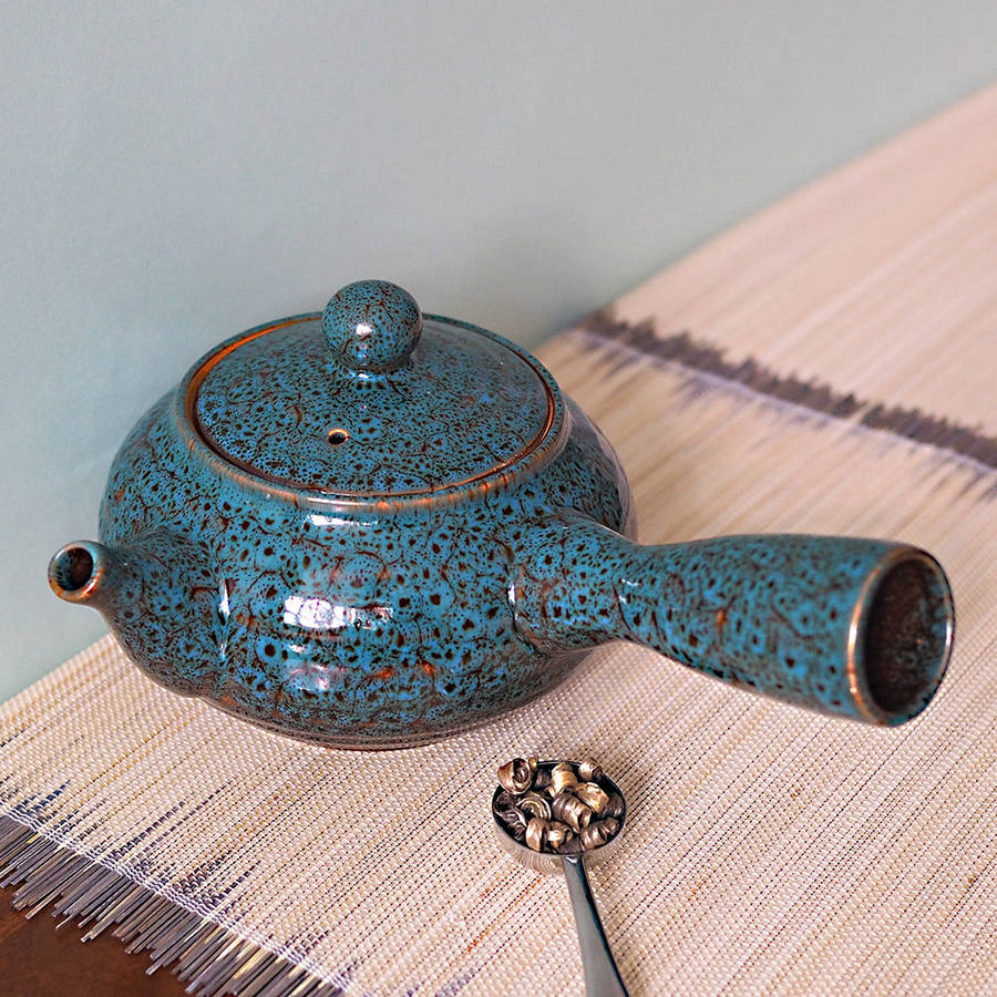 jun side handle ceramic teapot by the exotic teapot