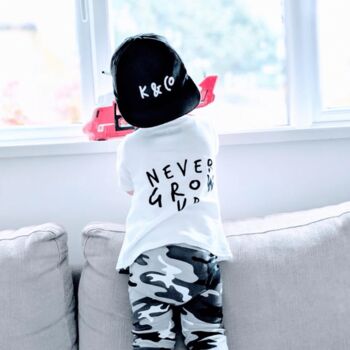 Never Grow Up Unisex Baby And Kids Short Sleeve T Shirt, 7 of 12