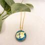 Elegant Blue Gold Foil Circle Necklace, Planet Earth, thumbnail 3 of 10