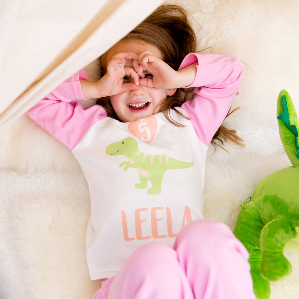 Personalised Dinosaur Age Pink / Blue Kids Pyjamas, 1 of 8