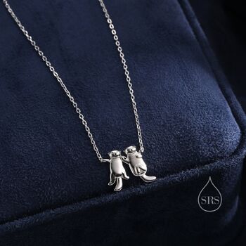 Tiny Otter Holding Hands Necklace, 4 of 11