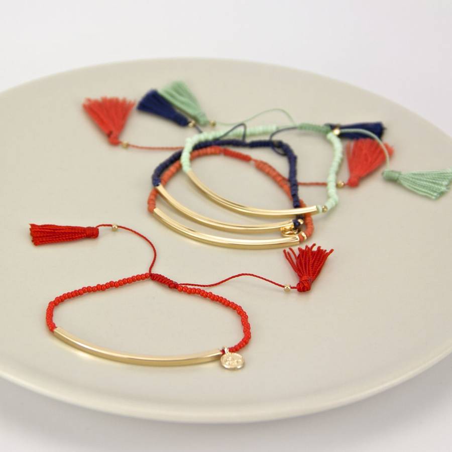 gold and seed bead friendship bracelet by gaamaa