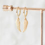 Gold Plated Wing Huggie Earrings, thumbnail 1 of 11