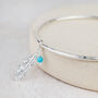 Sterling Silver Feather And Turquoise Charm Bangle, thumbnail 1 of 4
