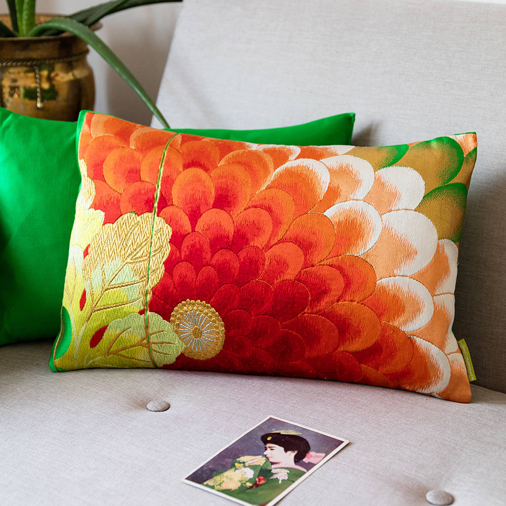 green red and gold floral embroidered cushion by hunted and stuffed