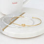 Sterling Silver Or 18ct Gold Plated Love Knot Bangle, thumbnail 2 of 3