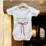 Personalised Baby's First Christmas Bow Babygrow, thumbnail 1 of 4