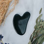Black Obsidian Crystal Gua Sha With Black Skull Pouch, thumbnail 2 of 5