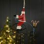 Santa On A Penny Farthing Hanging Christmas Decoration, thumbnail 1 of 4