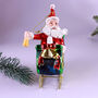 G Decor On The Way Santa In Sleigh Large Handcrafted Glass Ornament, thumbnail 3 of 3