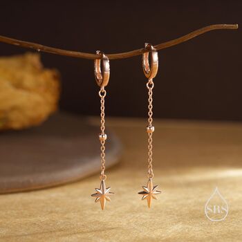 Sterling Silver Dangling Starburst Huggie Hoop Earrings, 5 of 11