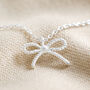 Tiny Pearl Bow Pendant Necklace, thumbnail 7 of 9