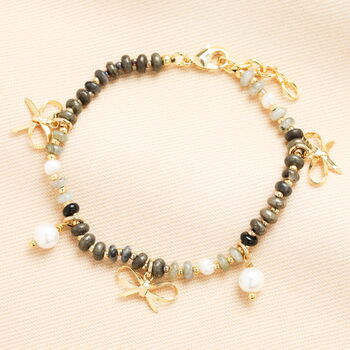 Semi Precious Black Beaded Bow Charm Bracelet In Gold, 2 of 4
