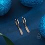 Sterling Silver Tiny Feather Huggie Hoops, thumbnail 2 of 12