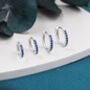 Sterling Silver Sapphire Blue Cz Huggie Hoop Earrings, thumbnail 7 of 12